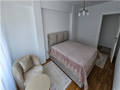 Apartament trei camere,decomandat, zona Titulescu, Interservisan cu 2 parcari subterane si boxa